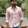 Man wearing Blush Horizon Handwoven Cotton Shirt by WovenWhale