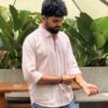 Man wearing Mauve Stripe Handwoven Cotton Shirt by WovenWhale