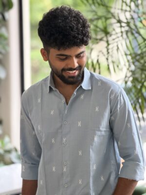 Man wearing Sky Color Handwoven Cotton Shirt by WovenWhale