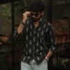 Lifestyle view of a model wearing the Black Single Ikat Shirt.