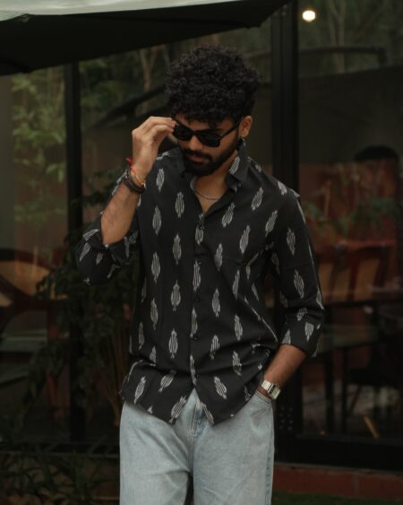 Lifestyle view of a model wearing the Black Single Ikat Shirt.